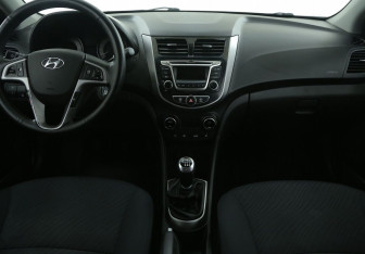 Подержанный автомобиль Hyundai Solaris Sedan 2014 года (12 фото)
