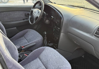 Подержанный автомобиль Kia Spectra Sedan 2007 года (7 фото)