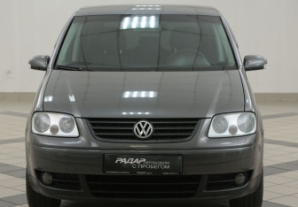 Подержанный автомобиль Volkswagen Touran 2005 года (6 фото)