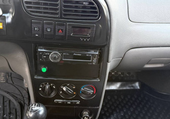 Подержанный автомобиль Kia Spectra Sedan 2007 года (8 фото)