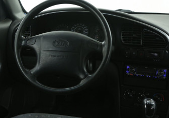 Подержанный автомобиль Kia Spectra Sedan 2008 года (14 фото)