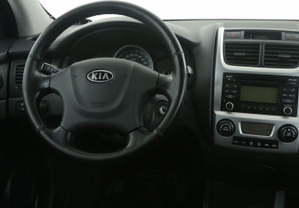 Подержанный автомобиль Kia Sportage 2010 года (14 фото)