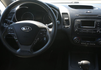 Подержанный автомобиль Kia Cerato Sedan 2013 года (14 фото)
