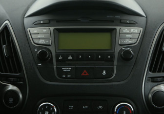 Подержанный автомобиль Hyundai ix35 2015 года (13 фото)