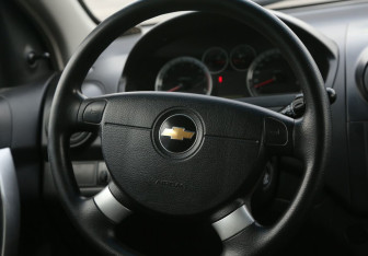 Подержанный автомобиль Chevrolet Aveo Hatchback 2011 года (16 фото)