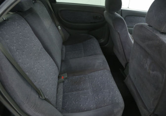 Подержанный автомобиль Kia Spectra Sedan 2006 года (11 фото)