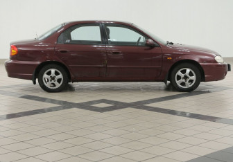 Подержанный автомобиль Kia Spectra Sedan 2006 года (5 фото)