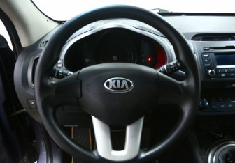 Подержанный автомобиль Kia Sportage 2013 года (9 фото)