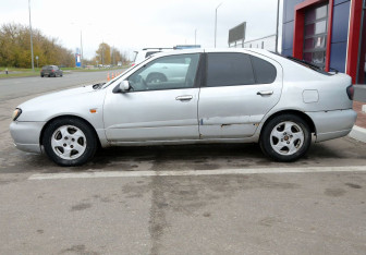 Подержанный автомобиль Nissan Primera Sedan 2001 года (8 фото)