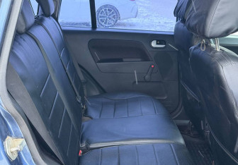 Подержанный автомобиль Ford Fusion 2006 года (10 фото)