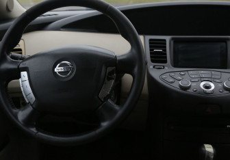 Подержанный автомобиль Nissan Primera Sedan 2004 года (14 фото)