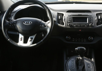 Подержанный автомобиль Kia Sportage 2012 года (14 фото)