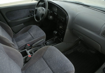 Подержанный автомобиль Kia Spectra Sedan 2006 года (9 фото)