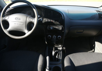 Подержанный автомобиль Kia Spectra Sedan 2007 года (12 фото)