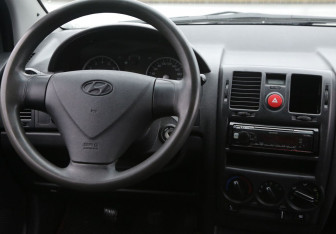 Подержанный автомобиль Hyundai Getz 2010 года (14 фото)