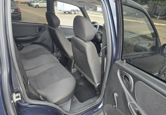 Подержанный автомобиль Chevrolet Niva 2011 года (12 фото)