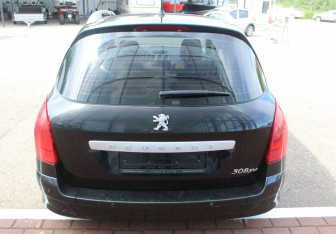 Подержанный автомобиль Peugeot 308 Wagon 2010 года (6 фото)