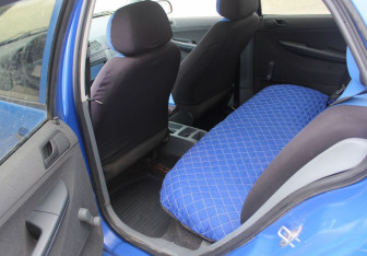 Подержанный автомобиль Skoda Fabia Hatchback 2003 года (11 фото)