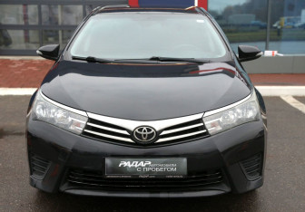 Подержанный автомобиль Toyota Corolla Sedan 2013 года (2 фото)