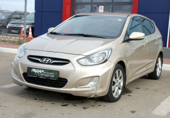 Подержанный автомобиль Hyundai Solaris Hatchback 2012 года (3 фото)