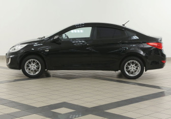 Подержанный автомобиль Hyundai Solaris Sedan 2013 года (7 фото)