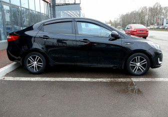 Подержанный автомобиль Kia Rio Sedan 2014 года (7 фото)