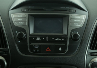 Подержанный автомобиль Hyundai ix35 2014 года (13 фото)