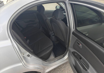 Подержанный автомобиль Kia Rio Sedan 2010 года (10 фото)