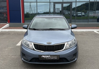 Подержанный автомобиль Kia Rio Hatchback 2014 года (2 фото)