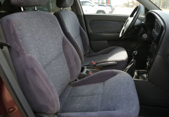 Подержанный автомобиль Kia Spectra Sedan 2007 года (10 фото)