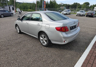 Подержанный автомобиль Toyota Corolla Sedan 2006 года (5 фото)