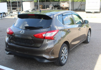 Подержанный автомобиль Nissan Tiida Hatchback 2015 года (7 фото)