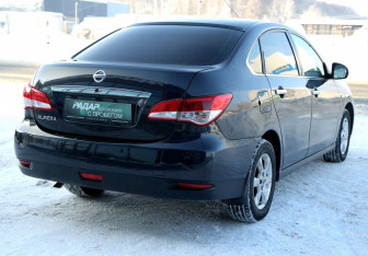 Подержанный автомобиль Nissan Almera Sedan 2013 года (6 фото)