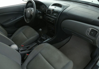 Подержанный автомобиль Nissan Almera Classic 2006 года (9 фото)
