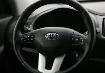 Подержанный автомобиль Kia Sportage 2013 года (16 фото)