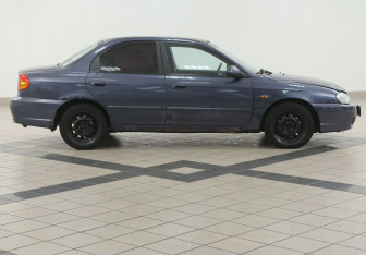 Подержанный автомобиль Kia Spectra Sedan 2006 года (5 фото)