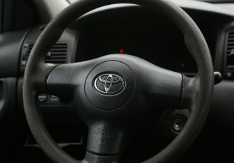 Подержанный автомобиль Toyota Corolla Sedan 2006 года (15 фото)