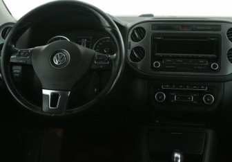 Подержанный автомобиль Volkswagen Tiguan 2014 года (14 фото)