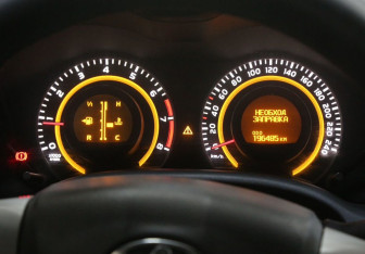 Подержанный автомобиль Toyota Corolla Sedan 2011 года (12 фото)