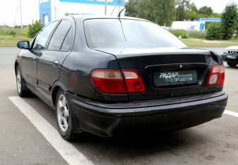 Подержанный автомобиль Nissan Almera Sedan 2002 года (4 фото)