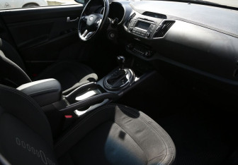 Подержанный автомобиль Kia Sportage 2012 года (9 фото)