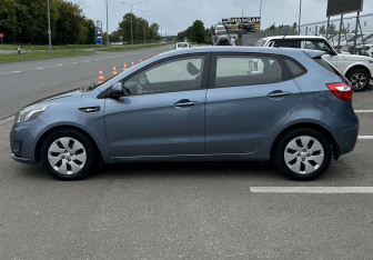 Подержанный автомобиль Kia Rio Hatchback 2014 года (6 фото)