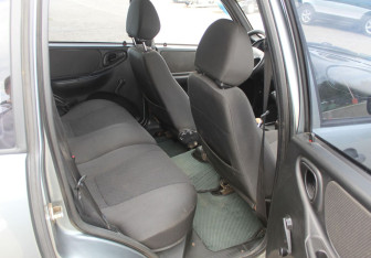 Подержанный автомобиль Chevrolet Niva 2008 года (12 фото)
