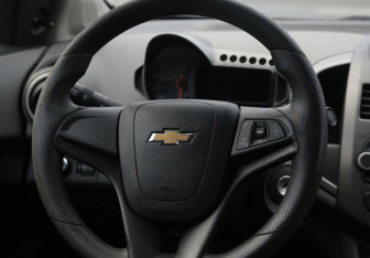 Подержанный автомобиль Chevrolet Aveo Sedan 2013 года (16 фото)