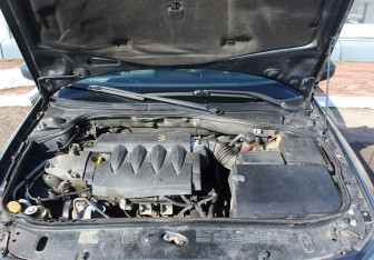 Подержанный автомобиль Renault Laguna Liftback 2007 года (15 фото)