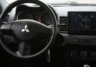 Подержанный автомобиль Mitsubishi Lancer Sedan 2008 года (14 фото)