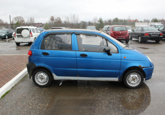Подержанный автомобиль Daewoo Matiz 2012 года (8 фото)