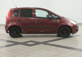 Подержанный автомобиль Mitsubishi Colt Hatchback 2006 года (5 фото)