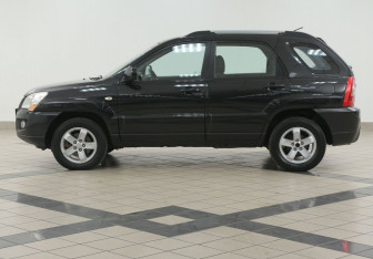 Подержанный автомобиль Kia Sportage 2009 года (7 фото)