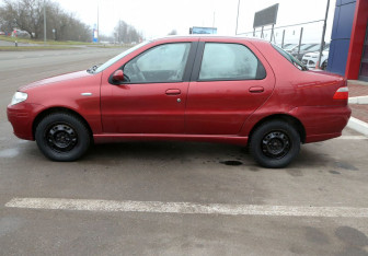 Подержанный автомобиль Fiat Albea 2010 года (8 фото)